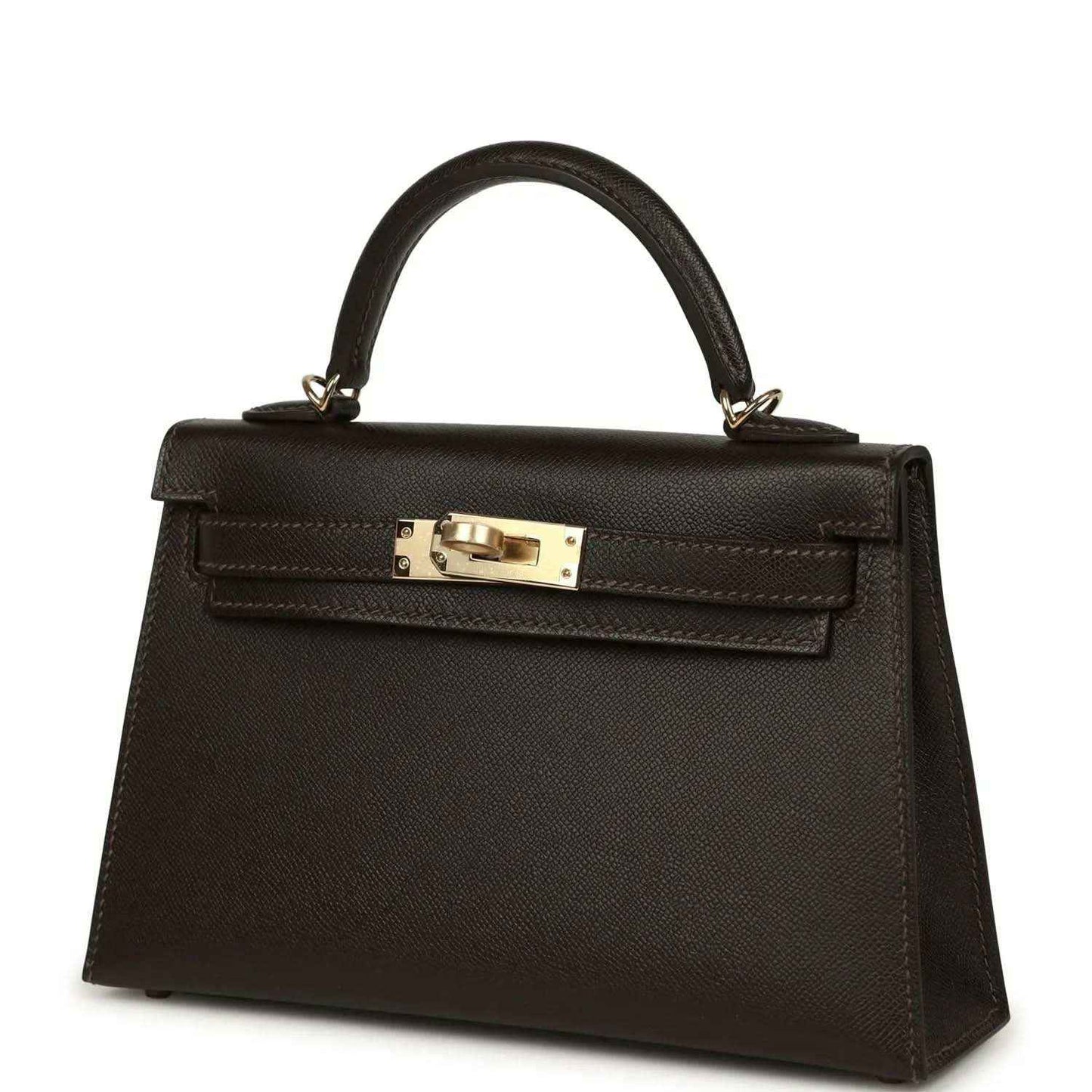 Dark leather mini top-handle bag with gold-tone turn-lock clasp on front flap