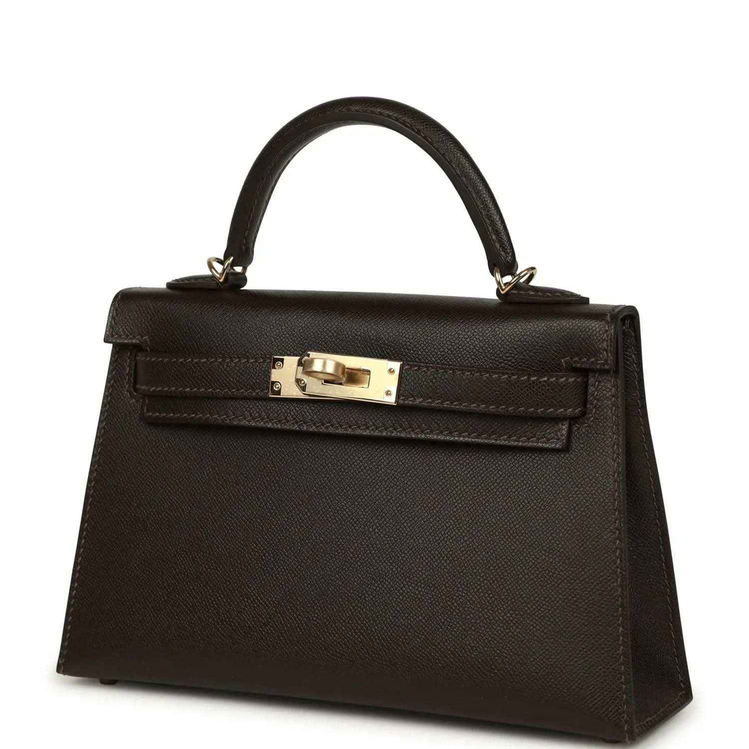 Dark leather mini top-handle bag with gold-tone turn-lock clasp on front flap