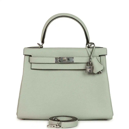 Hermes Kelly Retourne 28 bag in light gray-green with top handle and front turnlock