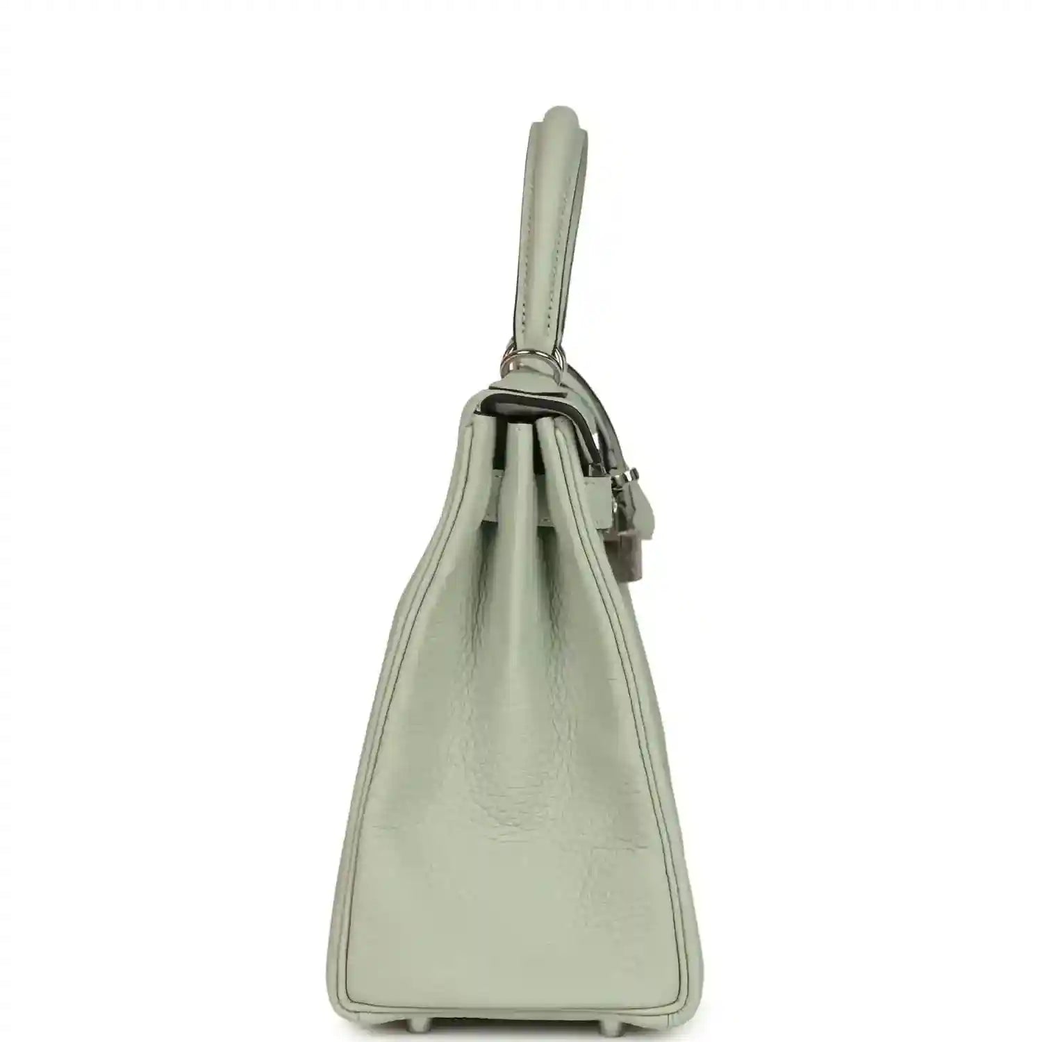 Hermes Kelly Retourne 28 bag side view with top handle and small base feet