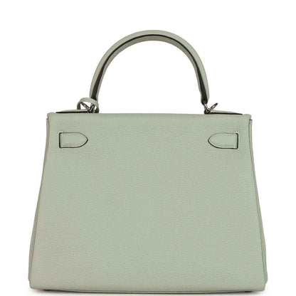 Hermes Kelly Retourne 28 bag front view with flap closure and two strap tabs