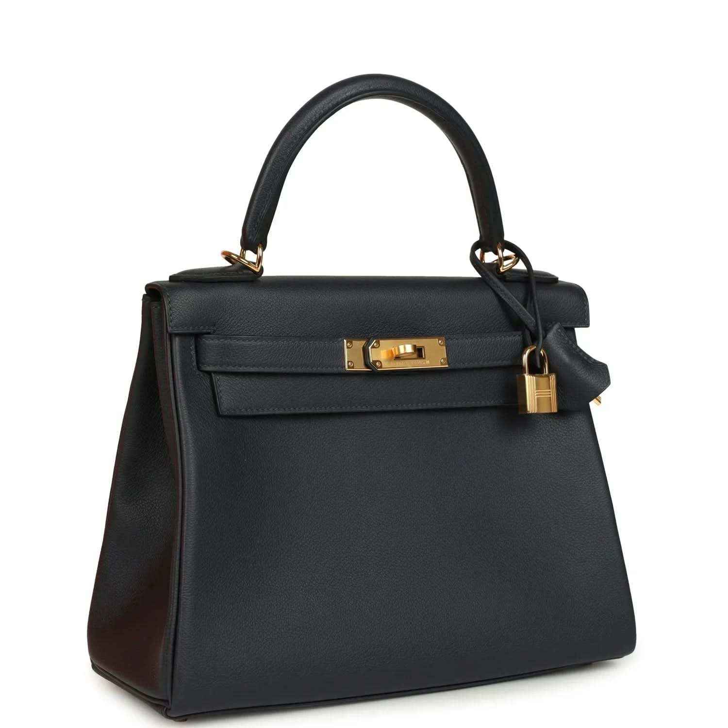Hermes Kelly Retourne 28 handbag, dark navy leather, gold lock hardware, top handles.