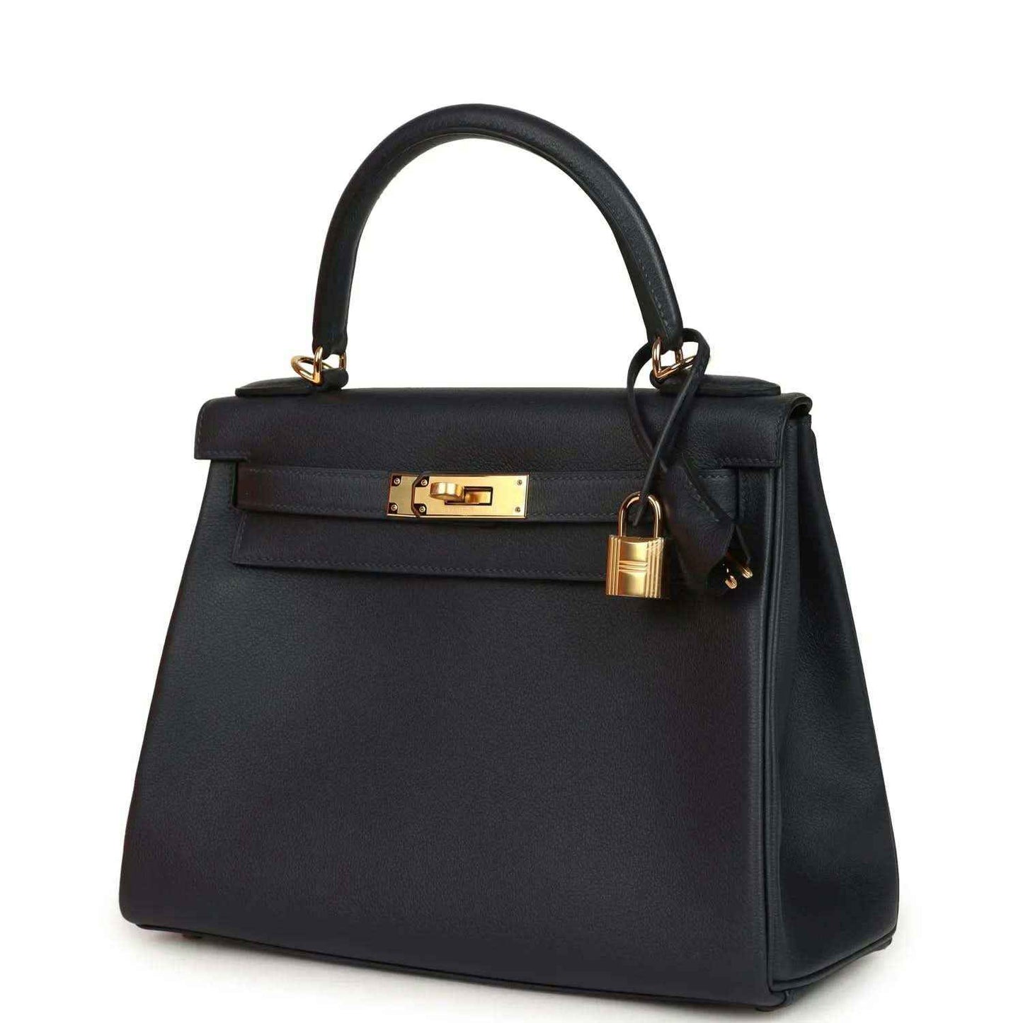 Hermes Kelly Retourne 28 handbag, dark navy leather, gold lock, top handle and strap.