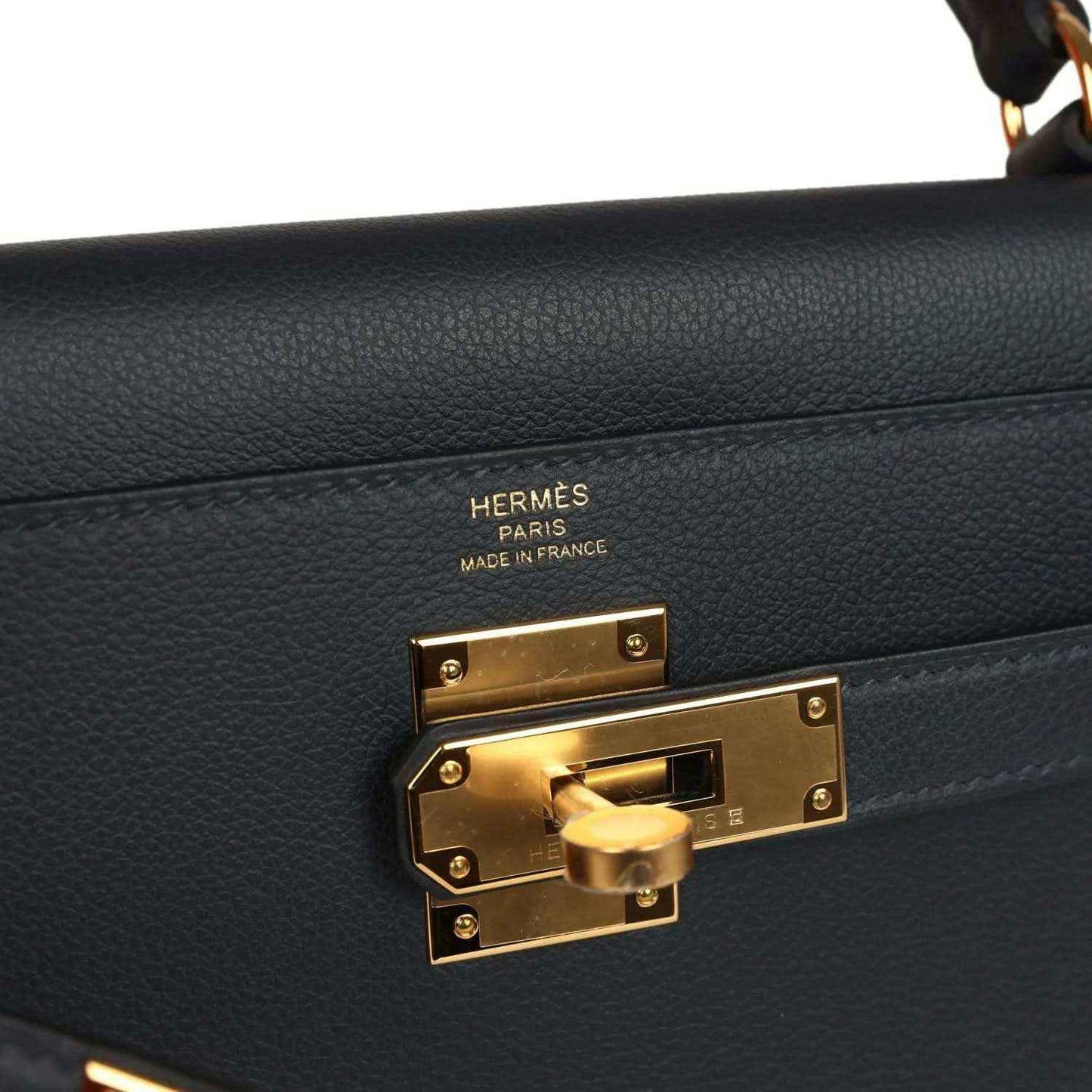 Hermes Kelly Retourne 28 clasp hardware with Hermes Paris engraving, gold tone.
