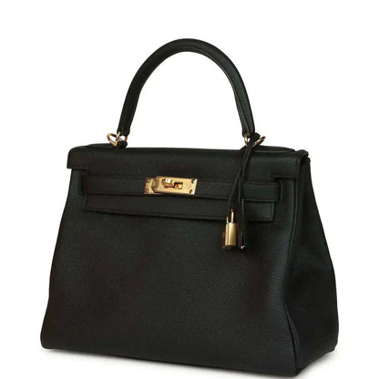 Hermes Kelly Retourne 28 handbag, black Togo leather with gold clasp and lock detail