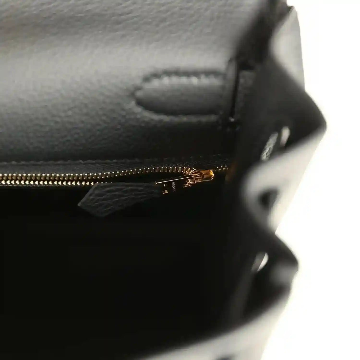 Hermes Kelly Retourne handbag interior pocket with gold zipper and leather stitching