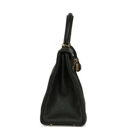 Hermes Kelly Retourne 28 black leather bag side view with gold-tone hardware and top handle