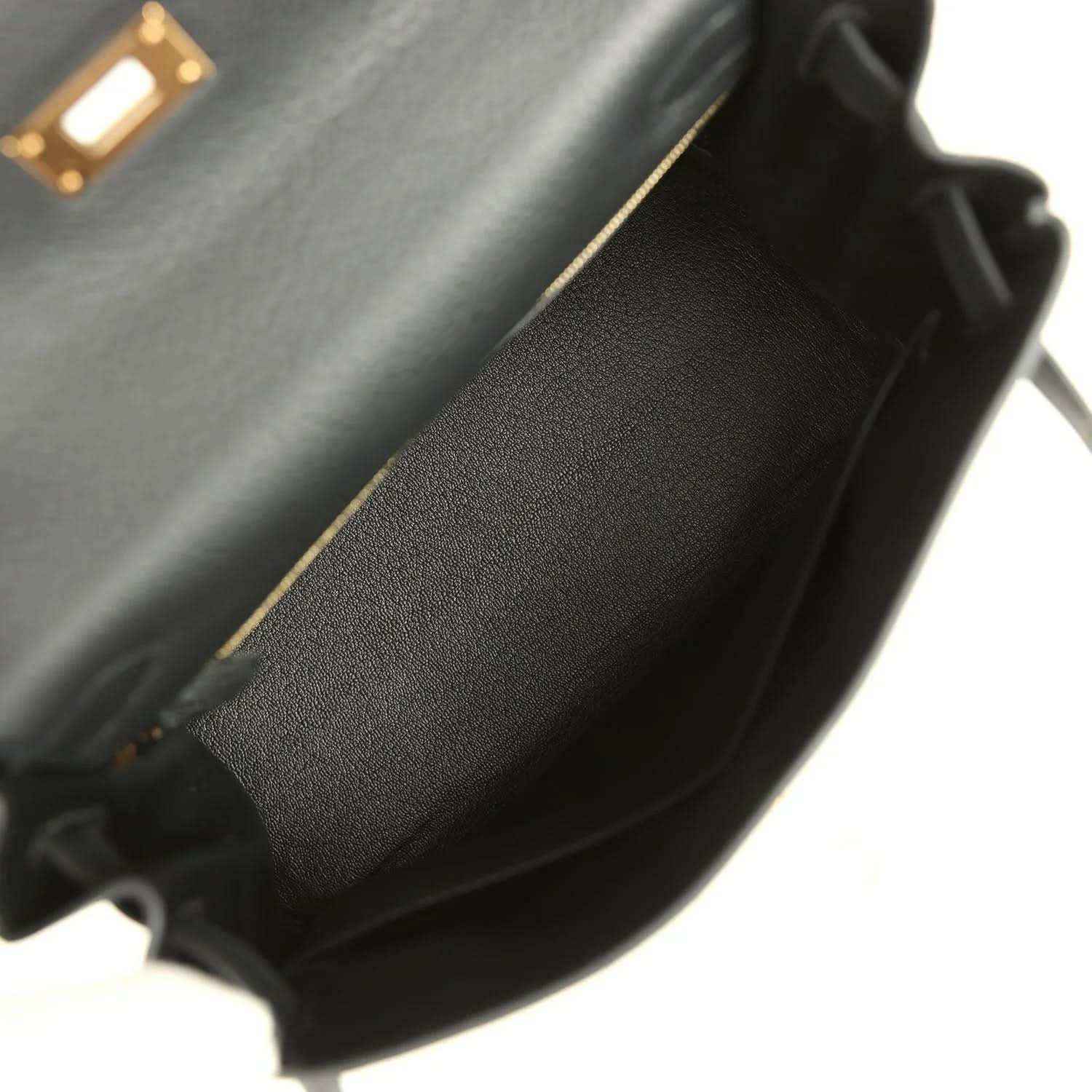 Hermes Kelly Retourne 28 black leather bag close-up of side edge and textured finish