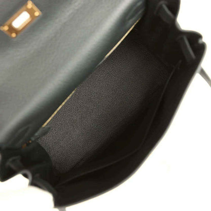 Hermes Kelly Retourne 28 black leather bag close-up of side edge and textured finish