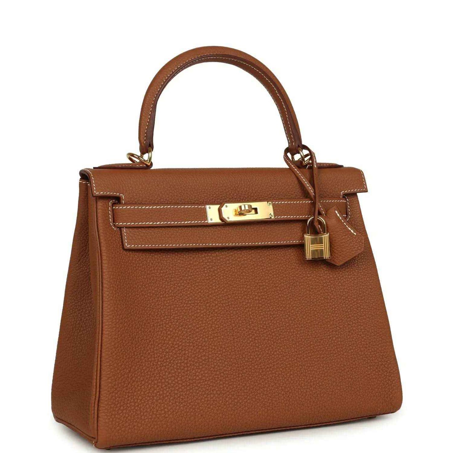Tan brown leather handbag with top handle, front flap and gold-tone clasp