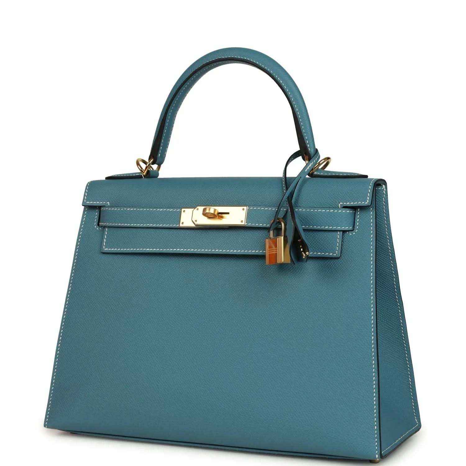 Blue leather Kelly handbag with gold lock hardware and removable shoulder strap.