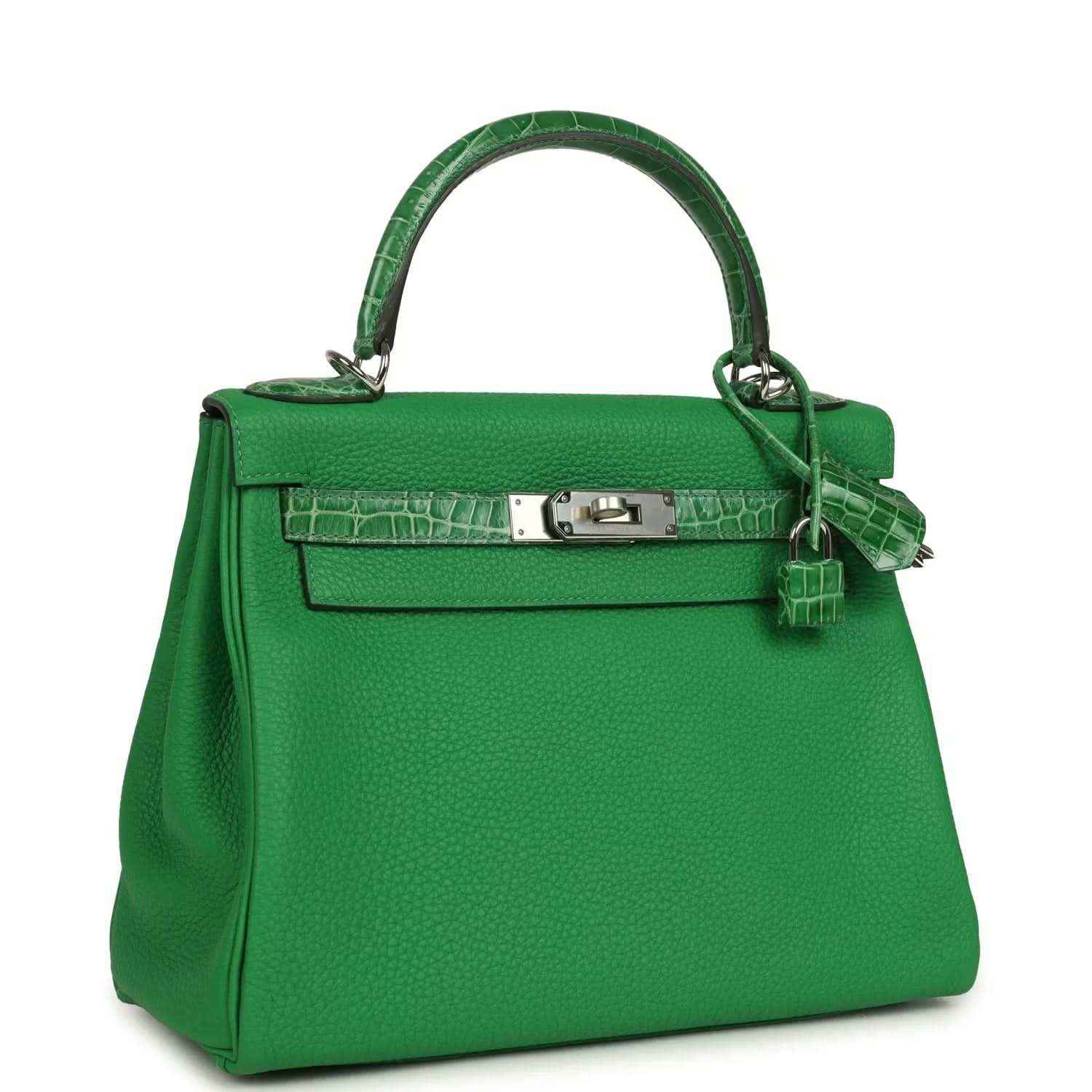 Green leather handbag with croc-pattern flap, front lock plate, and shoulder strap