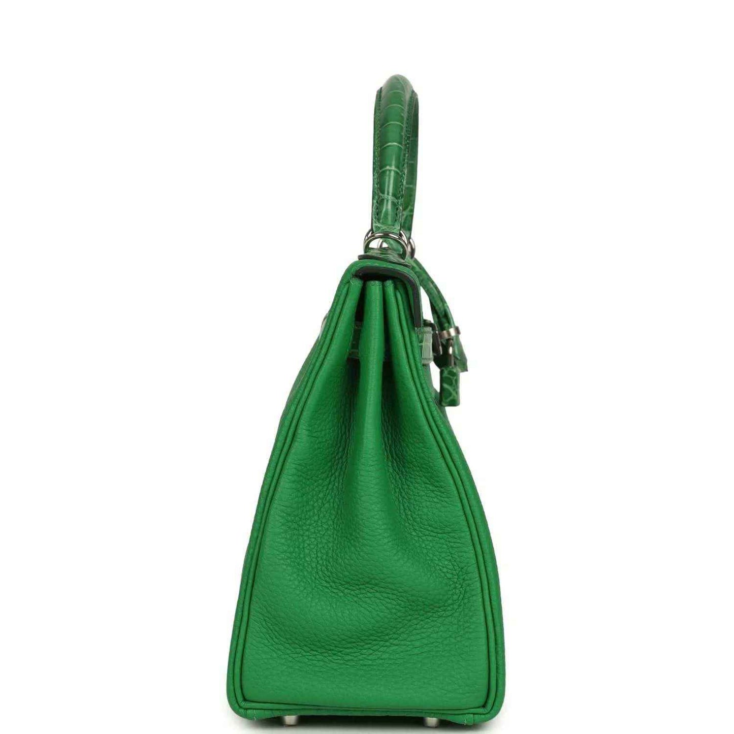 Green leather handbag with croc-pattern top handle and side profile view