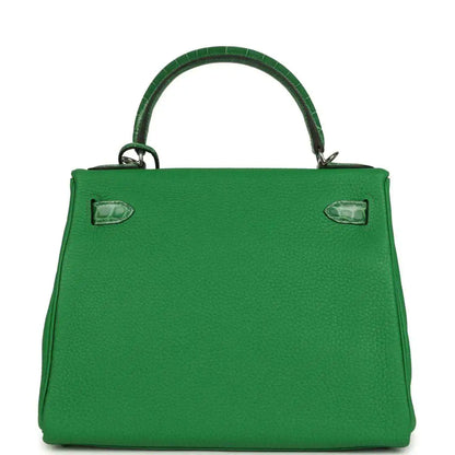 Green leather handbag front panel with corner details and embossed texture