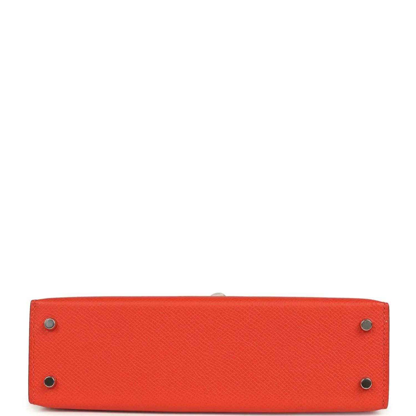 Red mini Kelly bag base with four silver-tone corner feet