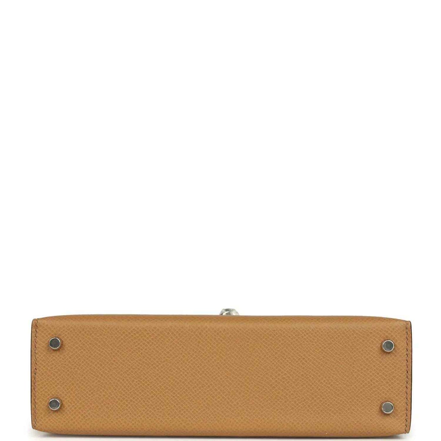 Hermes Kelly Sellier bag bottom view in biscuit Epsom leather with four protective studs