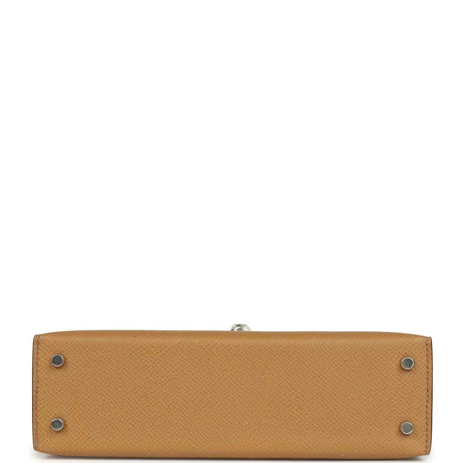 Hermes Kelly Sellier bag bottom view in biscuit Epsom leather with four protective studs