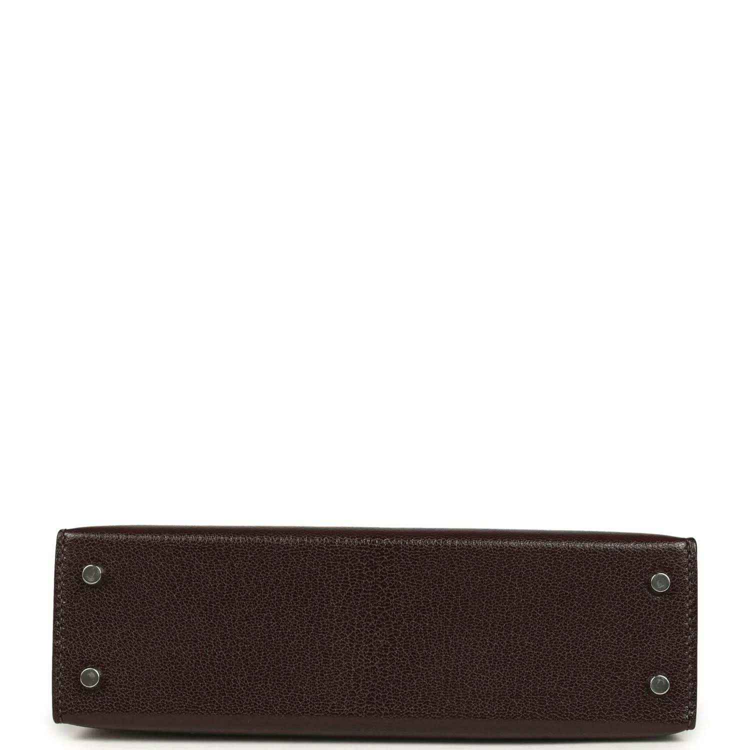 Small leather handbag bottom with metal feet and reinforced corners