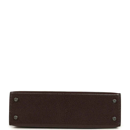 Small leather handbag bottom with metal feet and reinforced corners