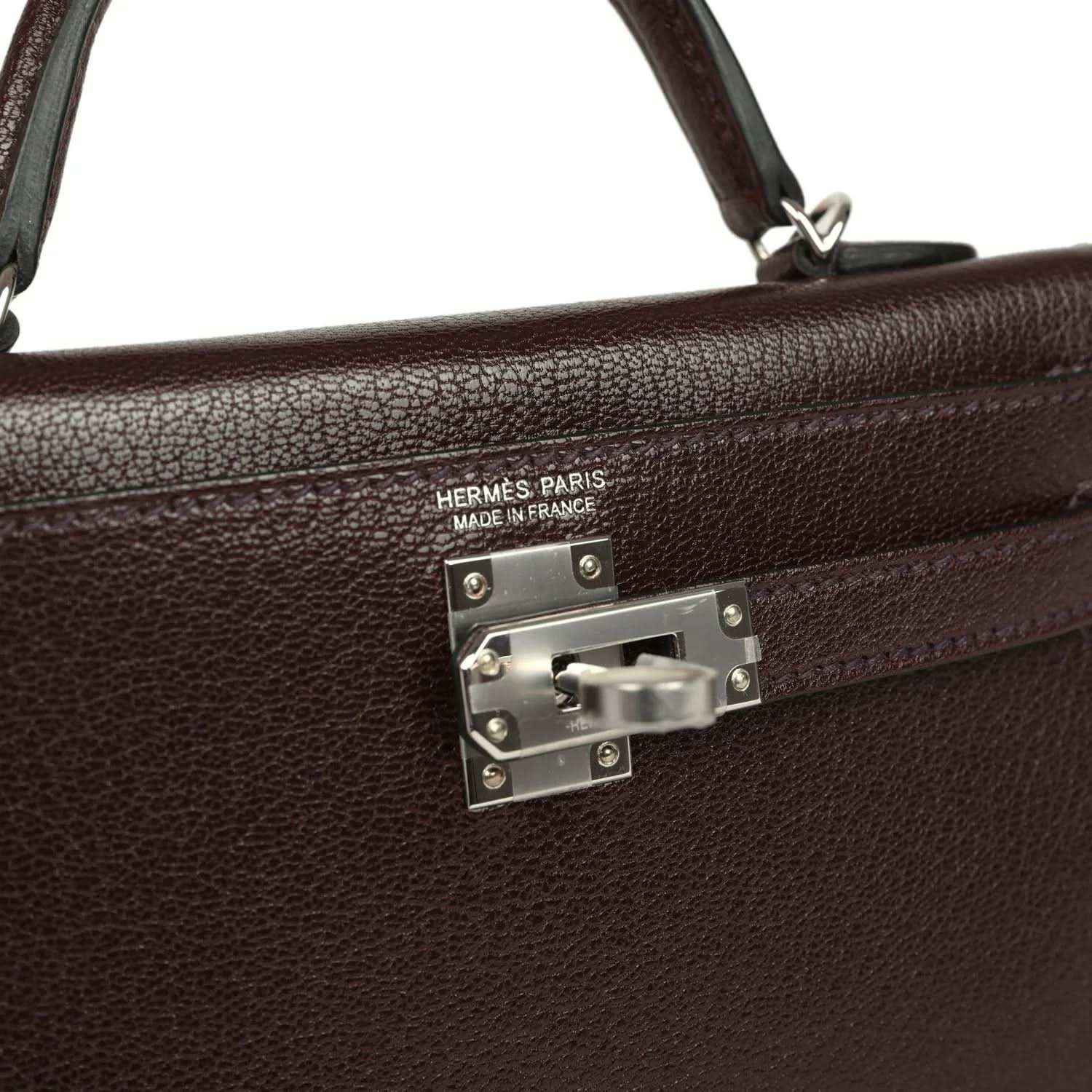 Hermès Paris handbag front clasp with engraved logo and metal plate