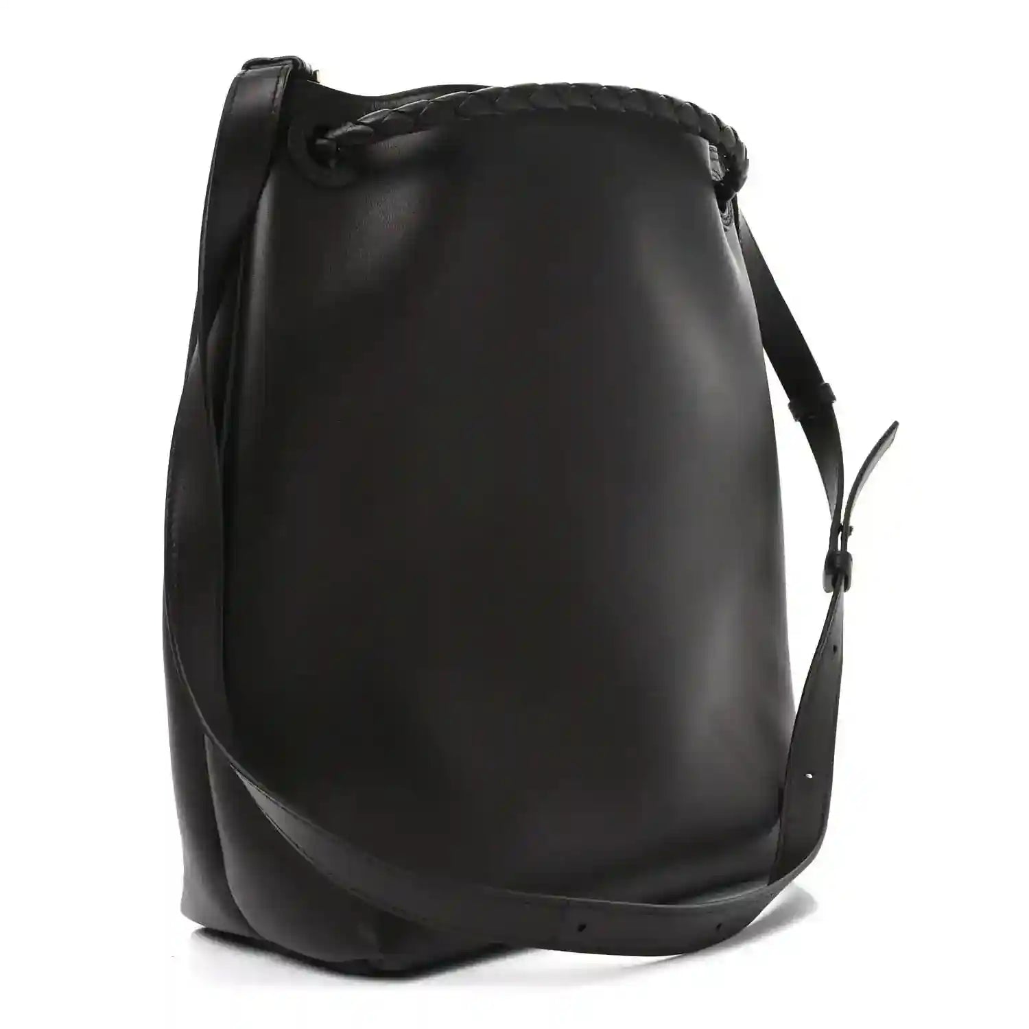 Small bucket bag in dark leather with structured curved shape and shoulder strap