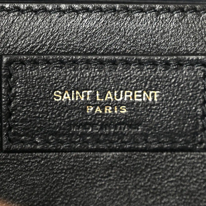 Black leather inner patch with 'SAINT LAURENT PARIS' text