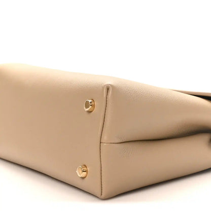 Beige Nino safari bag corner with gold stud feet and leather panel