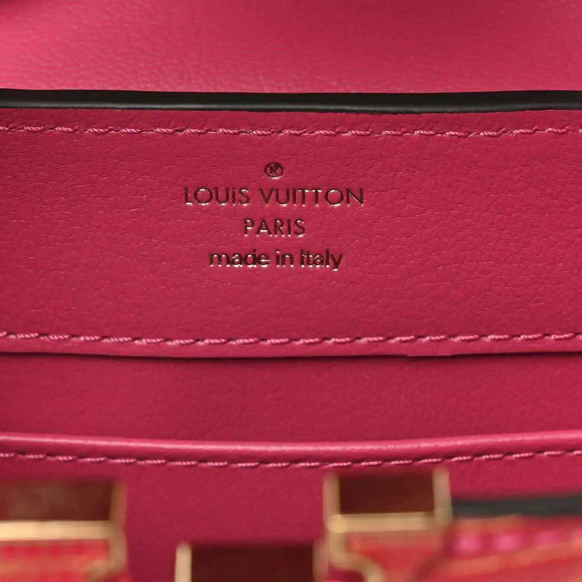 Louis Vuitton leather mini handbag label: LOUIS VUITTON PARIS, made in Italy.
