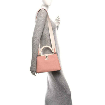 Rose mini leather handbag with short handles, gold clasp, and crossbody strap