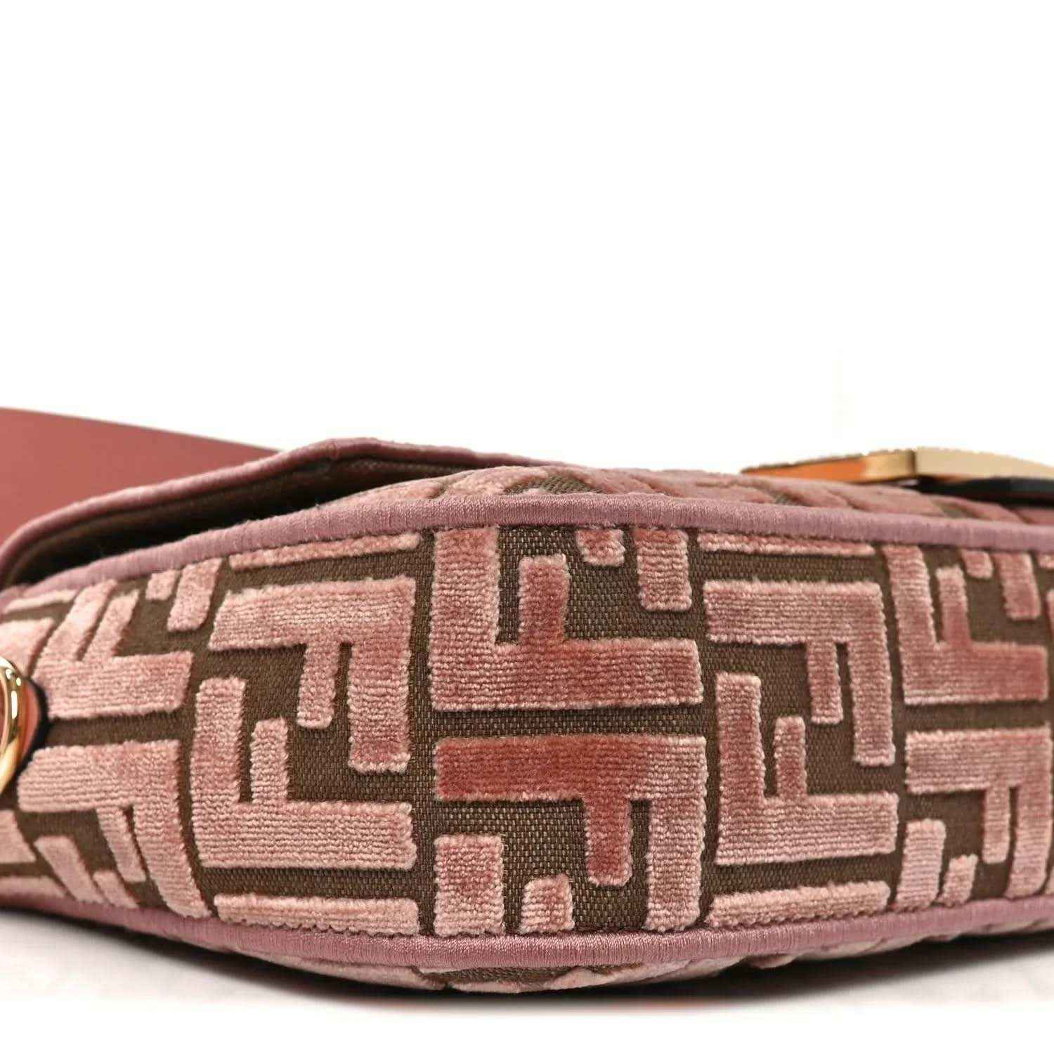 Top edge of pink velvet jacquard baguette bag with zipper and FF pattern