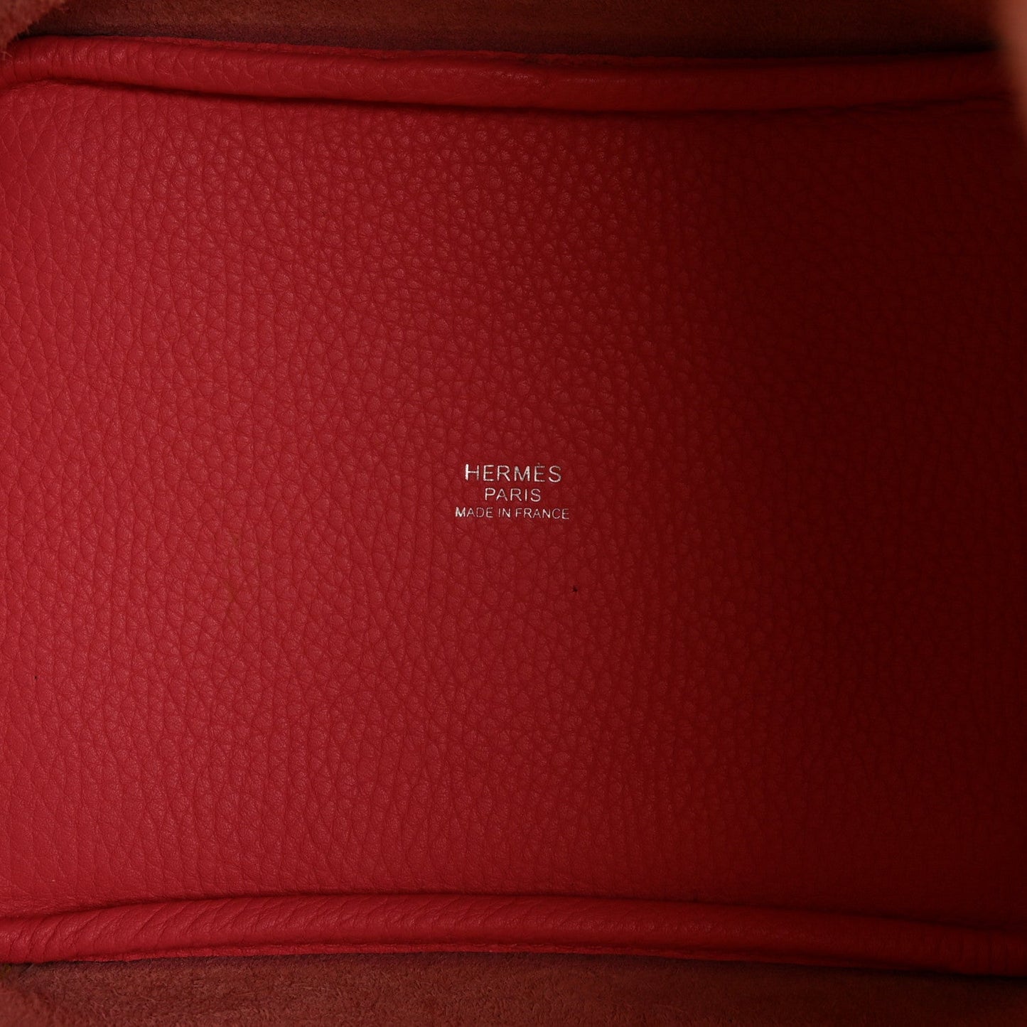 Red leather interior lining panel with Hermes Paris Made in France stamp