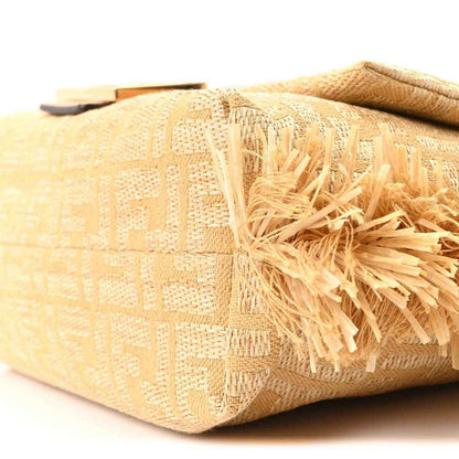 Fendi jacquard raffia fringe medium baguette bag, corner view with fringe detail and strap end