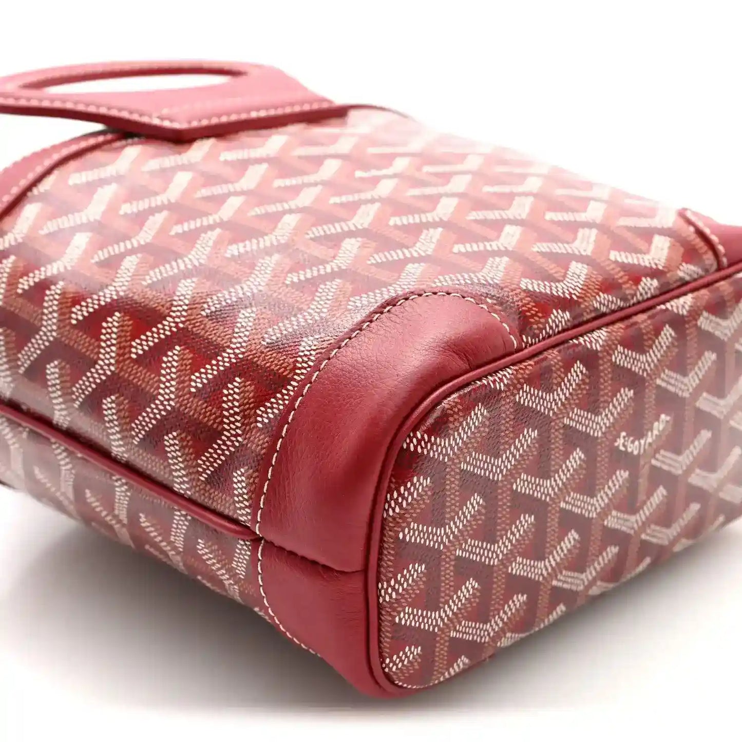 Red mini handbag with Goyardine pattern, smooth leather trim, top handle and strap