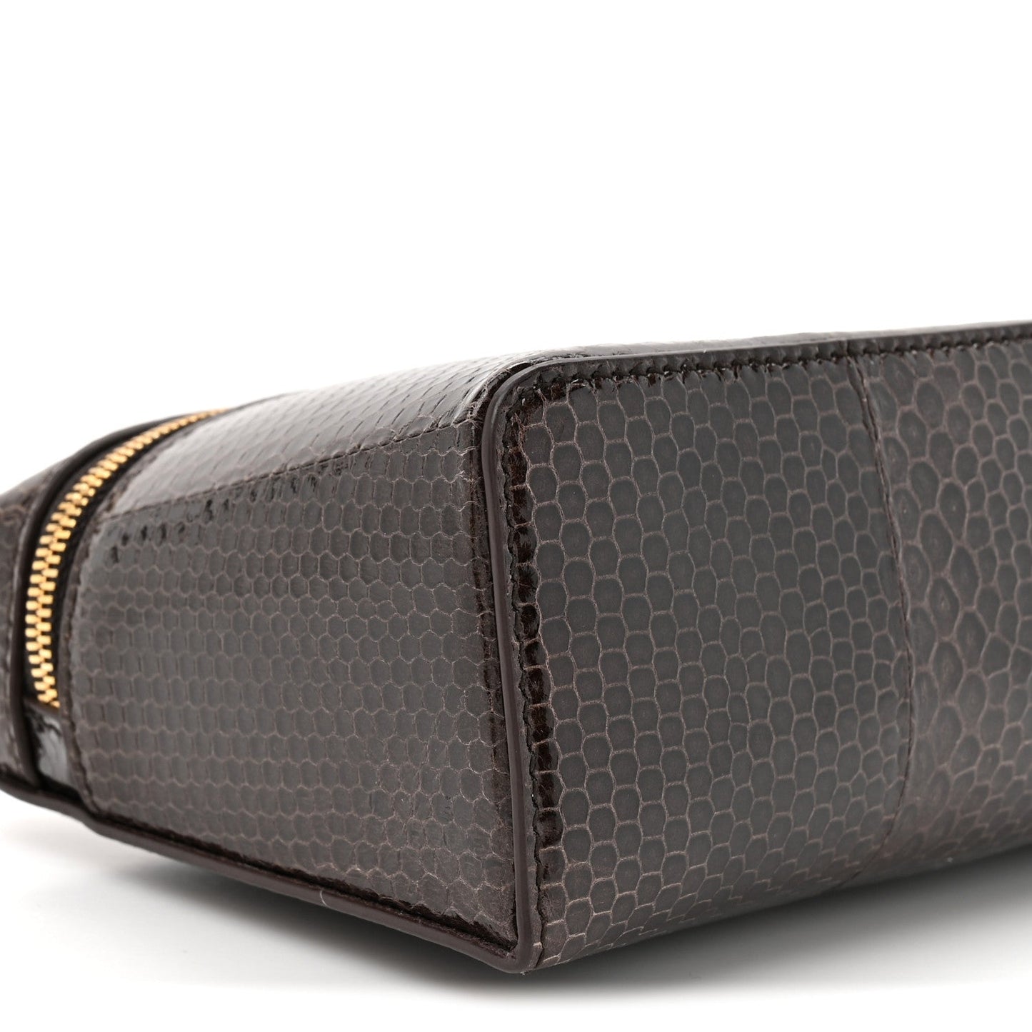 Loro Piana lizard leather pouch corner with gold zipper pull, dark brown finish
