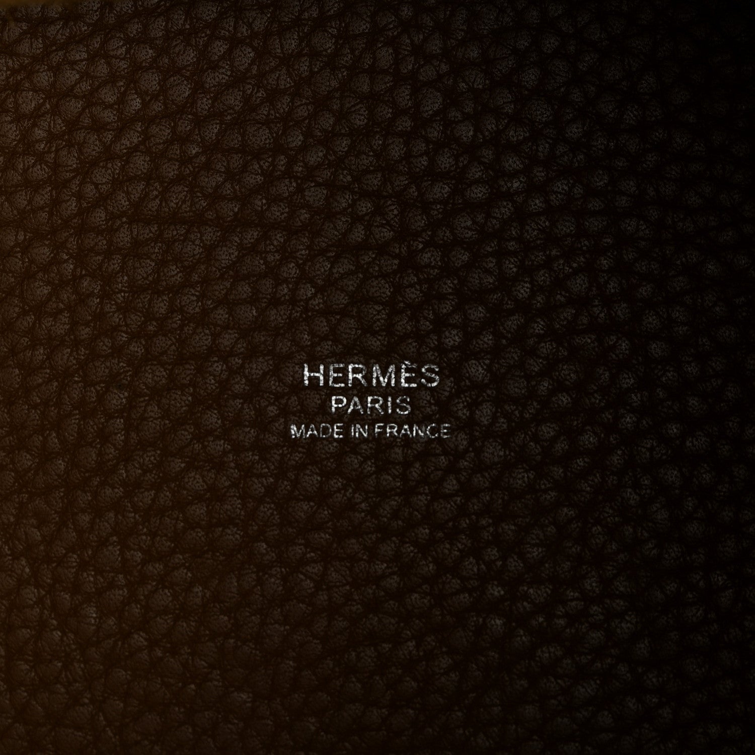 HERMÈS PARIS leather texture with “Made in France” stamp