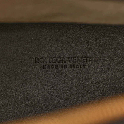 Bottega Veneta embossed on black leather weekender bag lining