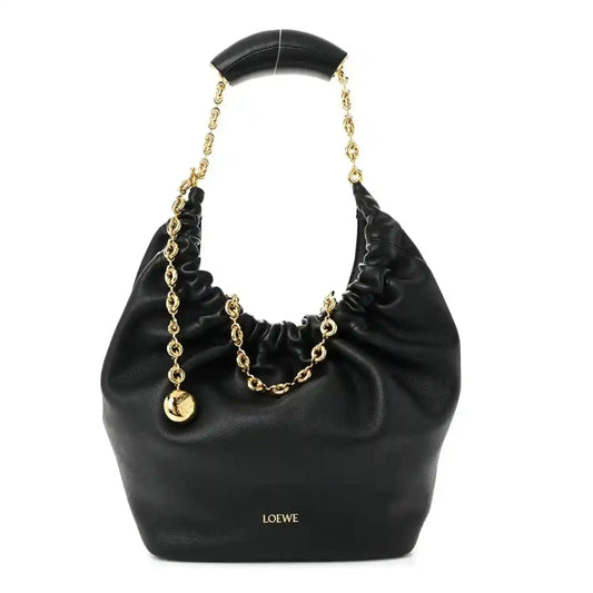 Loewe small squeeze bag in black ruched nappa leather with gold chain handle