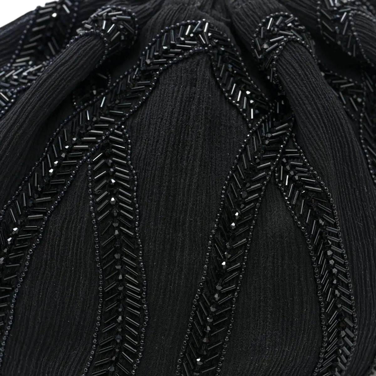 Black beaded embroidery pattern on chiffon silk crepe pochon bag