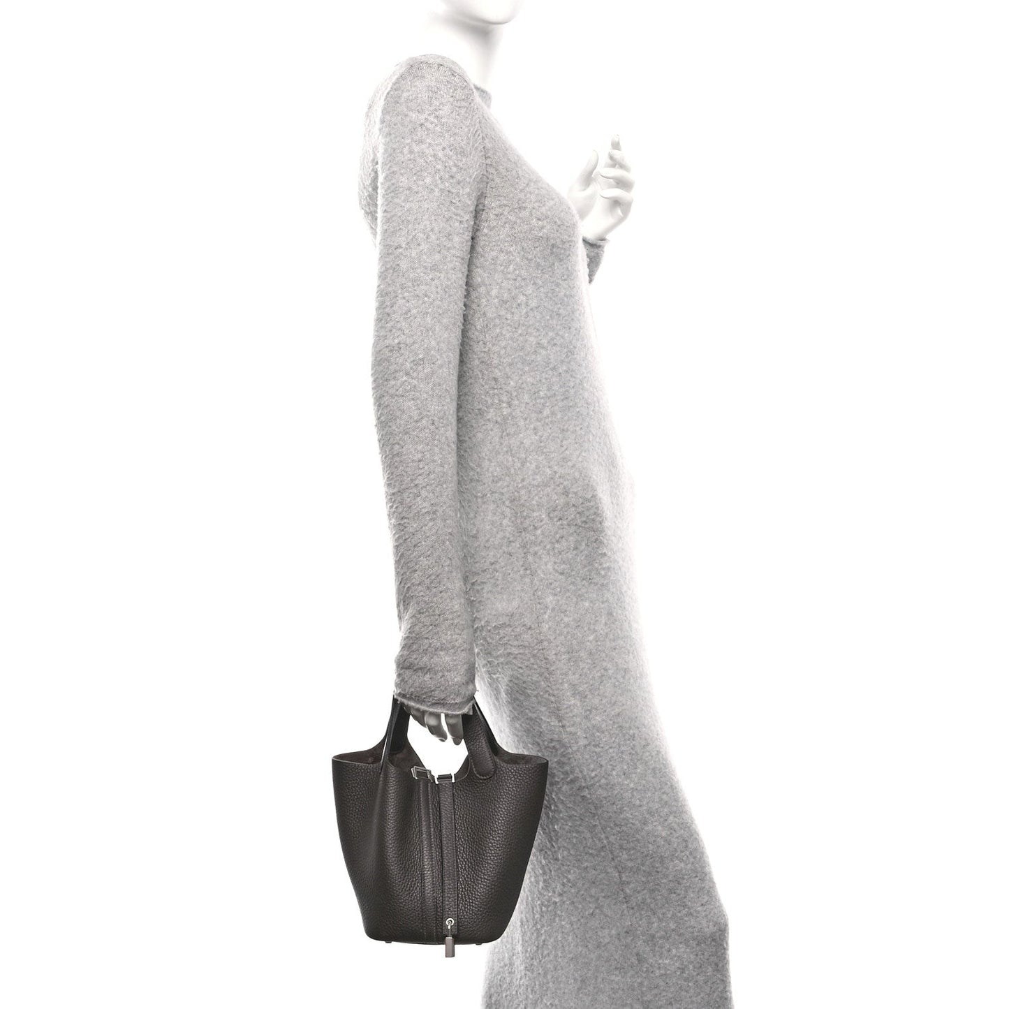 Dark brown leather tote bag with top handles and front lock closure, side view