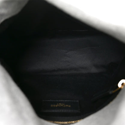 Saint Laurent Loulou satchel interior lining with zipper and fabric pocket.