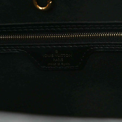 Black leather pouch base with Louis Vuitton logo stamp and gold zipper track