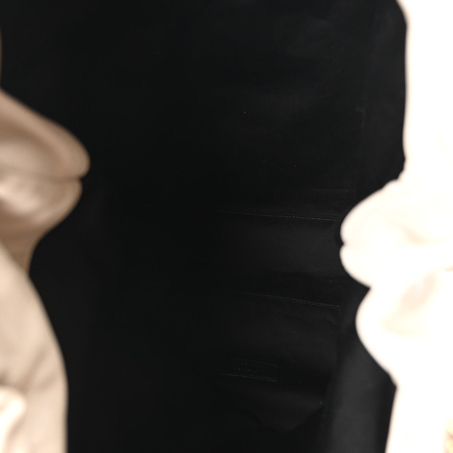 Dark fabric interior lining inside a tote bag