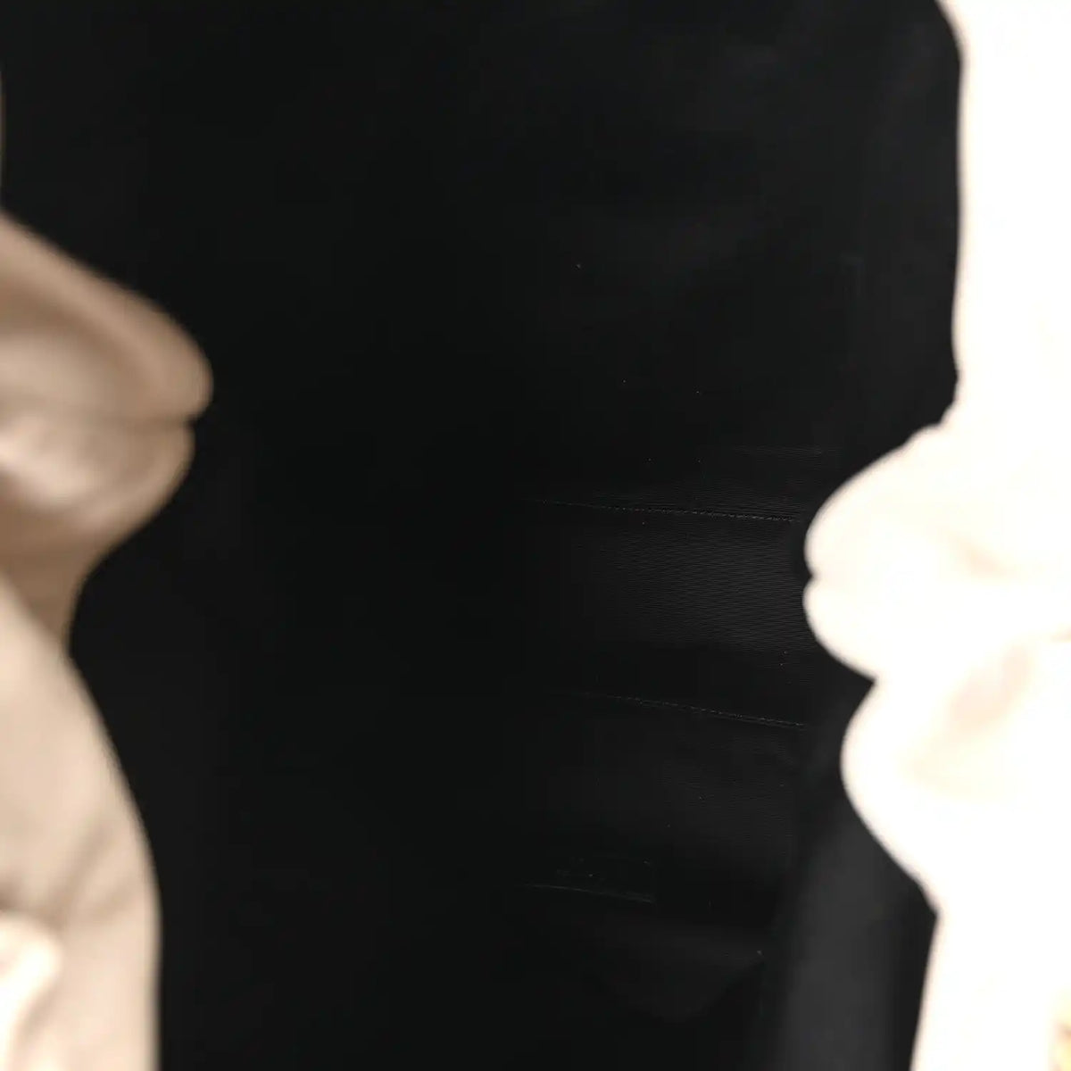 Dark fabric interior lining inside a tote bag