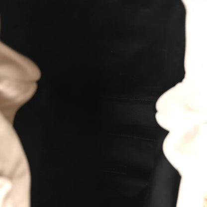 Dark fabric interior lining inside a tote bag