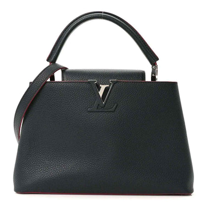 Louis Vuitton Capucines PM leather bag front, dark blue with fuchsia piping and LV emblem