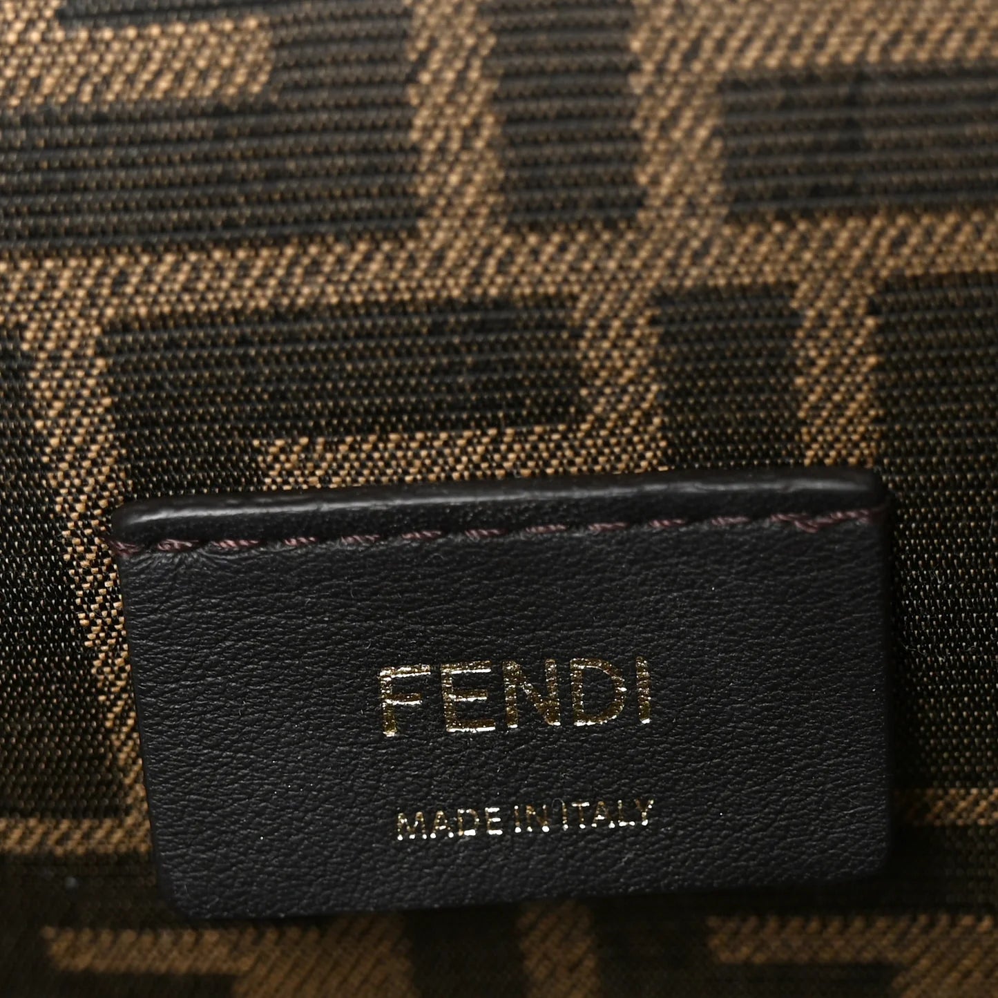 Black leather logo patch with FENDI and MADE IN ITALY text