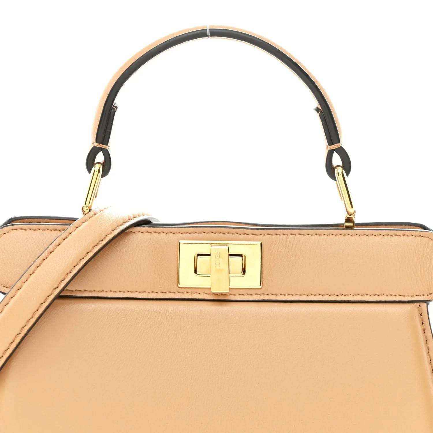 Small satchel front panel with gold-tone logo clasp and curved top handle