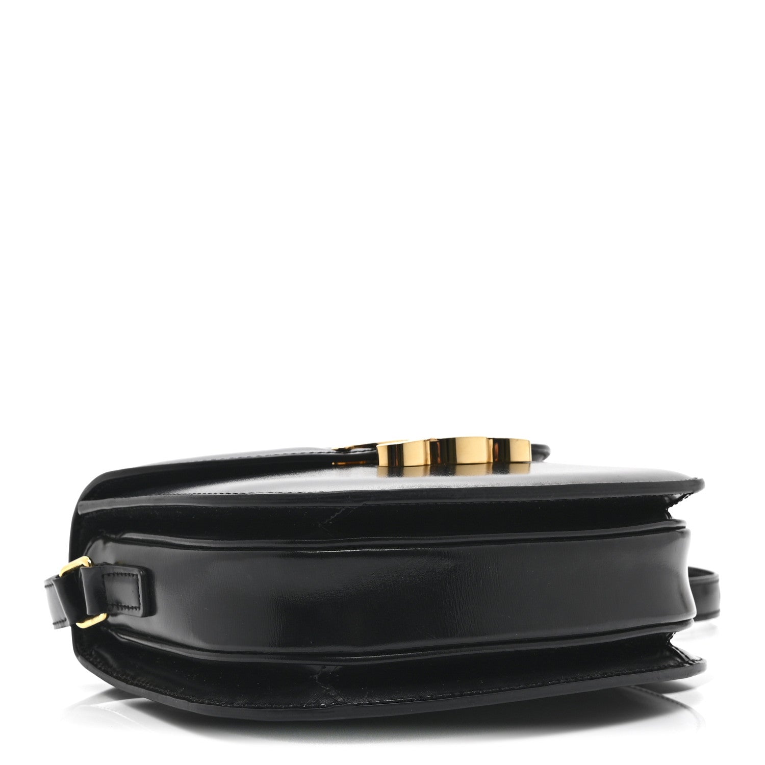Black leather crossbody bag side view with gold-tone top clasp and handle loop