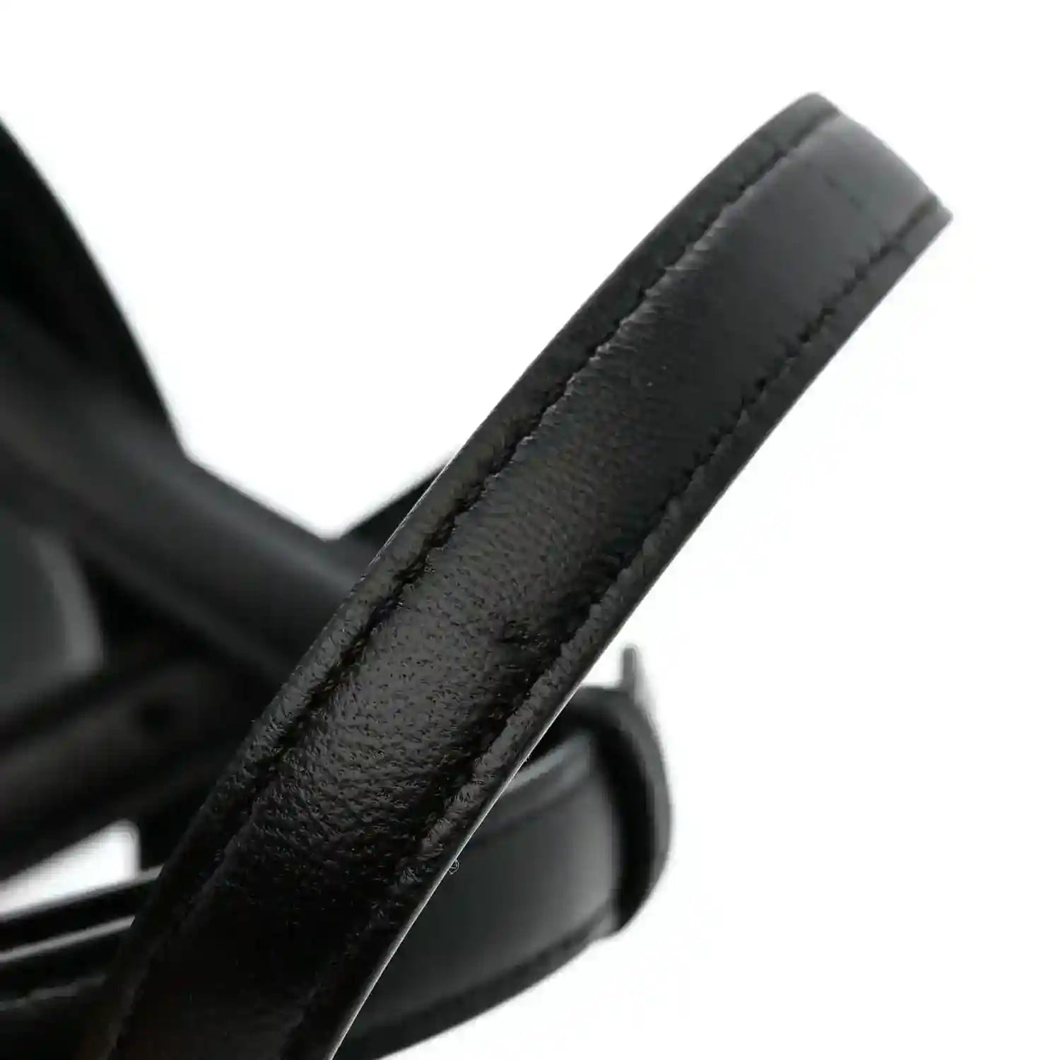 Black leather satchel handle end with metal ring detail