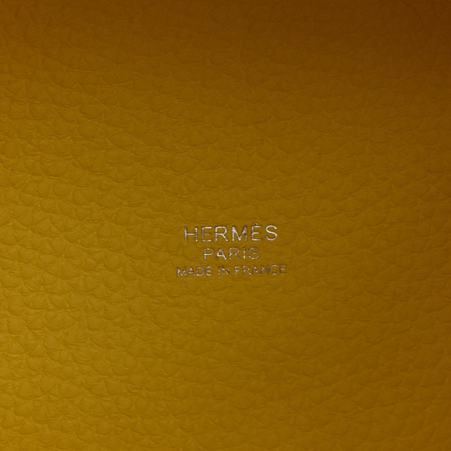Hermes Paris stamp and Made in France on lime leather